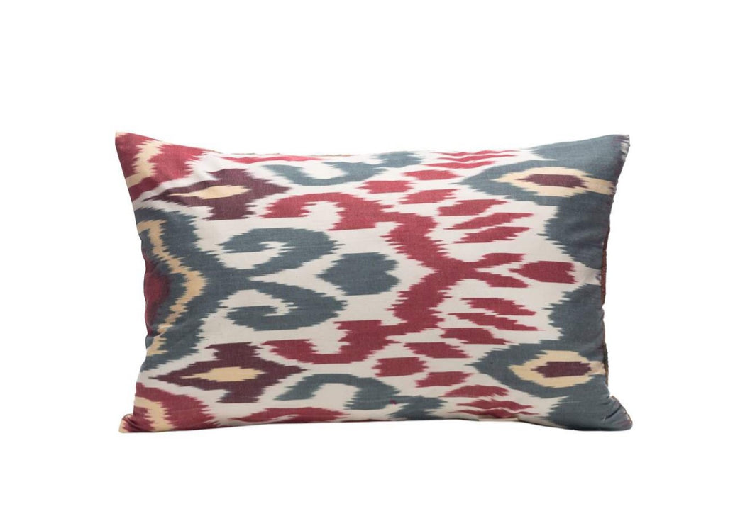 red and blue ikat cushion