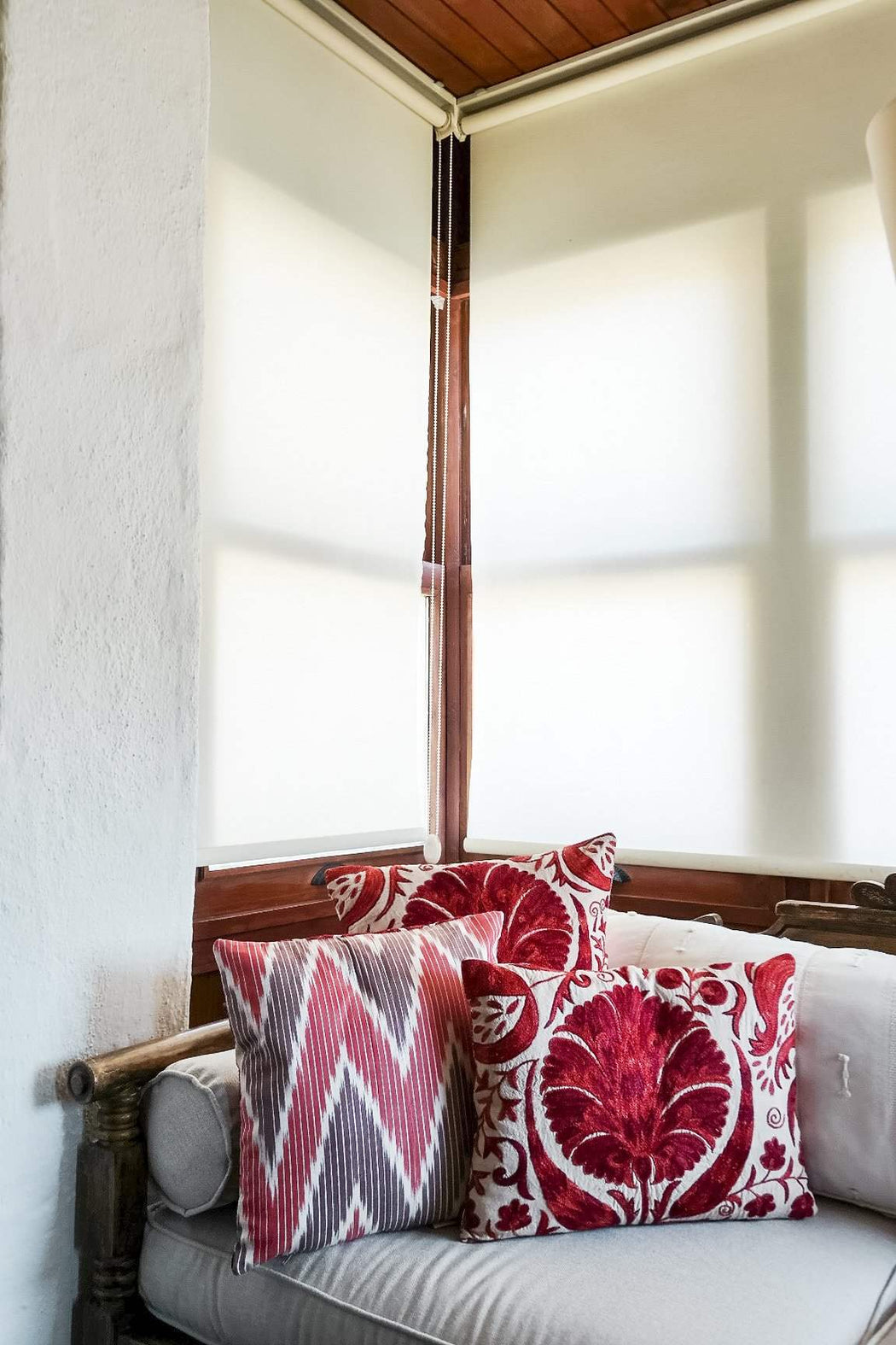 styled red suzani cushions
