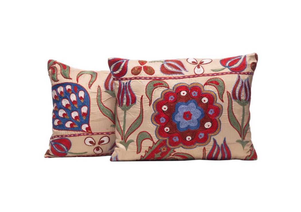 beige and red suzani cushions